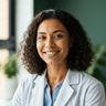 Close-up portrait of a professional healthcare educator in a bright office, smiling with confidence.